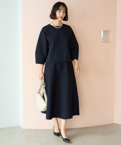 UNFILO(アンフィーロ)の「【セレモニー】BEAUTY FORM KNIT フレアスカート セットアップ(セットアップ・レディース・ベージュ系1/ブラック系/ネイビー系・LARGE/MEDIUM/SMALL)」の4枚目の写真