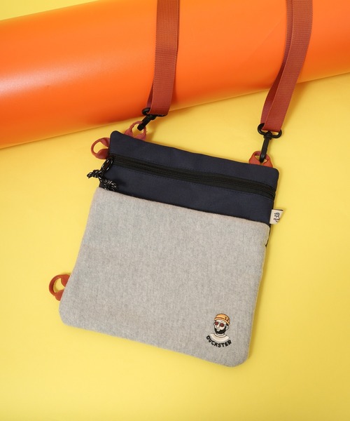 Duckster(ダックスター)の「DUCKSTER おじさん柄 ワッペン 2WAY サコッシュ ショルダーバッグ 男女兼用(ショルダーバッグ・メンズ・ネイビー・FREE)」の1枚目の写真