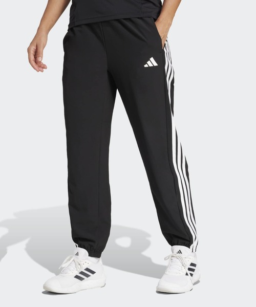 adidas(アディダス)の「トレイン エッセンシャルズ スリーストライプス ウーブンパンツ / アディダス adidas(その他パンツ・レディース・ブラック・XX-LARGE/LARGE/MEDIUM/SMALL/X-LARGE)」の1枚目の写真