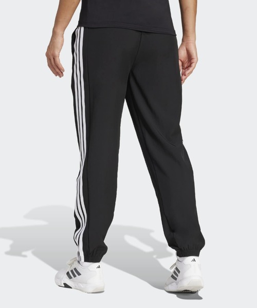 adidas(アディダス)の「トレイン エッセンシャルズ スリーストライプス ウーブンパンツ / アディダス adidas(その他パンツ・レディース・ブラック・XX-LARGE/LARGE/MEDIUM/SMALL/X-LARGE)」の3枚目の写真
