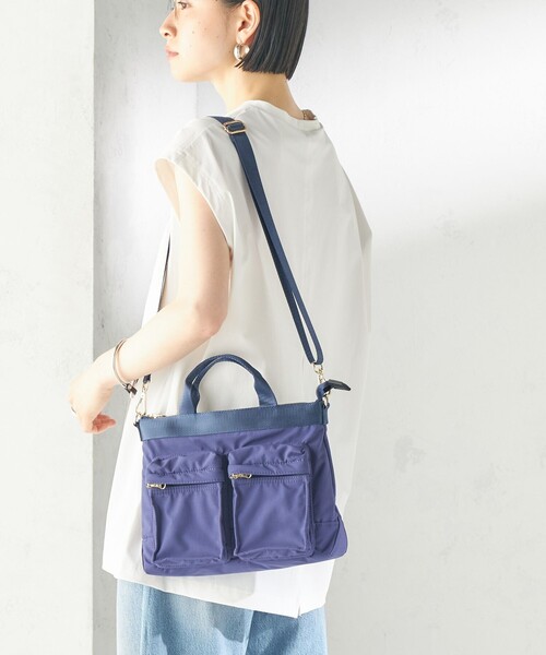 SHIPS(シップス)の「【WEB限定】Hyman Roth:〈撥水加工〉ナイロン ミニ ヘルメット バッグ(ショルダーバッグ・レディース・ネイビー/ブラック/ライトカーキ・ONE SIZE)」の1枚目の写真