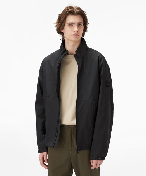 TOMMY HILFIGER(トミーヒルフィガー)の「ナイロンブルゾン(ブルゾン・メンズ・ネイビー/ブラック・LARGE/MEDIUM/SMALL/X-LARGE)」の1枚目の写真