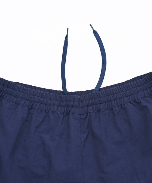 NEW BALANCE（ニューバランス）の「パラシュートパンツ（その他パンツ・レディース・ネイビー/アイボリー・LARGE/MEDIUM/SMALL/X-LARGE）」の18枚目の写真
