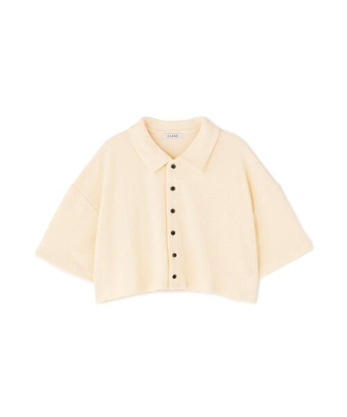 CLANE(クラネ)の「CLANE/クラネ/CRISP CROPPED POLO TOPS(ポロシャツ・レディース・ブラック/アイボリー/レッド・F)」の1枚目の写真