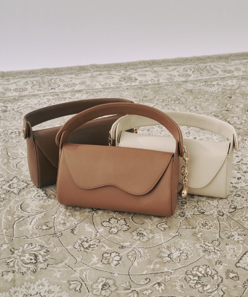 nunela ブラウン フラップハンドバッグ nunela（ヌネラ）の「flap hand bag【No.6】（ハンドバッグ