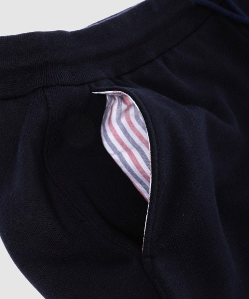 THOM BROWNE（トムブラウン）の「CLASSIC SWEATPANTS IN CLASSIC LOOP BACK W/ ENGINEERED 4 BAR（スウェットパンツ・レディース・ライトグレー/ネイビー・38/36）」の5枚目の写真