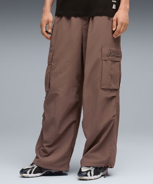 PUMA(プーマ)の「PUMA/プーマ× RIPNDIP/リップンディップ EXTREME CARGO PANTS オーバーサイズ カーゴパンツ(カーゴパンツ・メンズ・ブラック/ブロンズ・L/XL/M)」の2枚目の写真