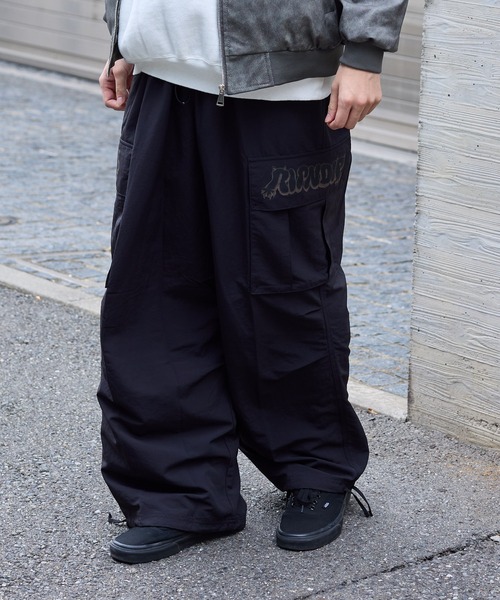 PUMA(プーマ)の「PUMA/プーマ× RIPNDIP/リップンディップ EXTREME CARGO PANTS オーバーサイズ カーゴパンツ(カーゴパンツ・メンズ・ブラック/ブロンズ・L/XL/M)」の16枚目の写真
