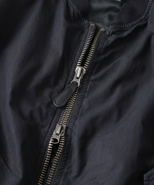 JOURNAL STANDARD（ジャーナルスタンダード）の「オーバー フィット ライト ボンバー ガーメントダイ ブルゾン（MA-1・メンズ・オレンジ/ブラック系その他/ライトブルー・LARGE/MEDIUM）」の20枚目の写真