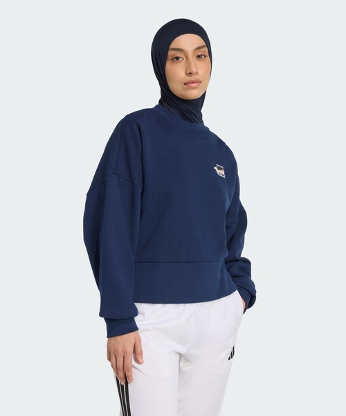 adidas(アディダス)の「キャット パッチ グラフィック スウェットシャツ / トレーナー / アディダス adidas(スウェット・レディース・ブルー・XX-LARGE/LARGE/MEDIUM/SMALL/X-LARGE/X-SMALL)」の3枚目の写真