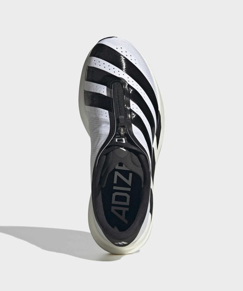 adidas(アディダス)の「アディゼロ EVO SL ジップ / Adizero EVO SL ZIP / ランニングシューズ / アディダス adidas(スニーカー・レディース・ホワイト・22.5cm/23.0cm/23.5cm/24.0cm/24.5cm/25.0cm/25.5cm/26.0cm/26.5cm)」の2枚目の写真