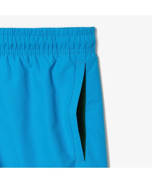 LACOSTE(ラコステ)の「BOYS エッセンシャルスイムショーツ(水着・メンズ・ブルー/グリーン・104/140/128/116)」の13枚目の写真