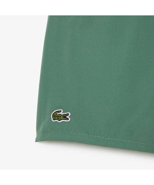 LACOSTE(ラコステ)の「BOYS エッセンシャルスイムショーツ(水着・メンズ・ブルー/グリーン・104/140/128/116)」の4枚目の写真