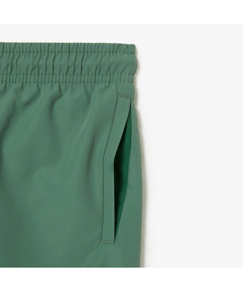 LACOSTE(ラコステ)の「BOYS エッセンシャルスイムショーツ(水着・メンズ・ブルー/グリーン・104/140/128/116)」の12枚目の写真