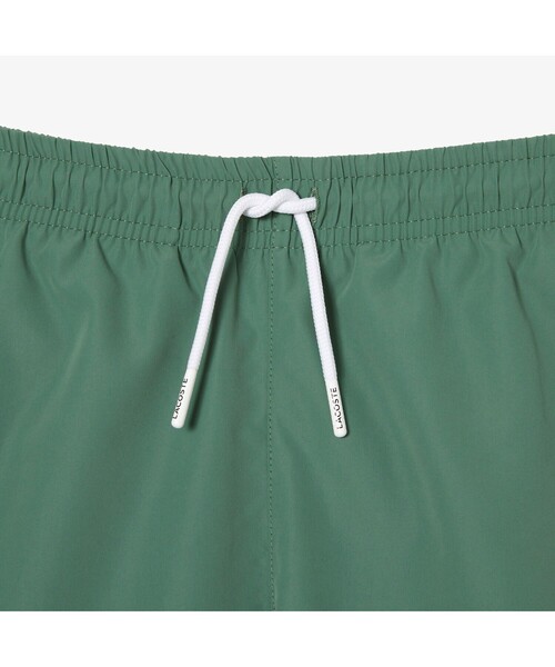 LACOSTE(ラコステ)の「BOYS エッセンシャルスイムショーツ(水着・メンズ・ブルー/グリーン・104/140/128/116)」の14枚目の写真