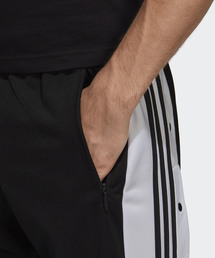 adidas（アディダス）の「スナップパンツ [SNAP PANTS