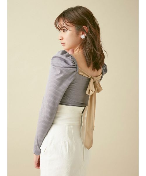 dazzlin(ダズリン)の「バックリボンパワショルトップス(Tシャツ/カットソー・レディース・オフホワイト/ブラック/ブルー/モカ・FREE)」の4枚目の写真