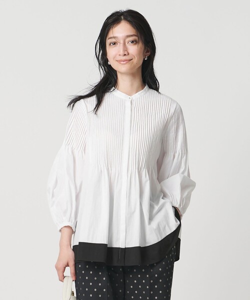 UNITED ARROWS(ユナイテッドアローズ)の「ピンタック バンドカラー ブラウス(シャツ/ブラウス・レディース・ライトピンク/ホワイト/ネイビー・FREE)」の1枚目の写真