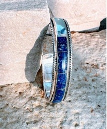 Donnaruma（ドンナルンマ）の「「Lapis note」チャンレイタイプ　天然石ハーフラピスラズリ バングル（バングル/リストバンド）」