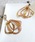 The RuleiU[j́uThe Rule U[FSpectrum metal combination pierced earring: XyNg^ RrsAXisAXipjjvbx[W