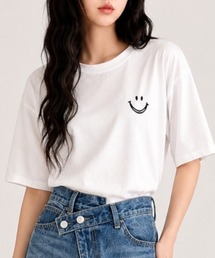 Megil（メギル）の「フェイスロゴプリントTシャツ（Tシャツ/カットソー）」