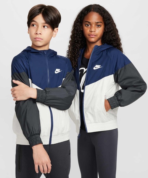 NIKE(ナイキ)の「ナイキ スポーツウェア ウィンドランナー ジュニア フーデッド レペル ジャケット / Nike Sportswear Windrunner Big Kids' Hooded Repel Jacket FZ5516-410 Midnight Navy(ブルゾン・キッズ・ネイビー・130/140/150/160/170)」の1枚目の写真