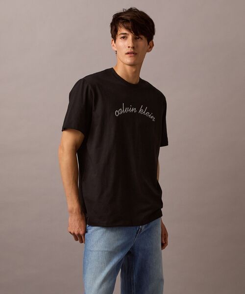 Calvin Klein(カルバン・クライン)の「【ユニセックス】グラフィック Tシャツ(Tシャツ/カットソー・メンズ・ホワイト/ブラック・L/M/S/XS)」の9枚目の写真