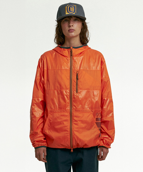 TEKET(テケット)の「Imagiscript Ripstop Wind Jacket Orange(ナイロンジャケット・レディース・その他・SMALL/MEDIUM/LARGE)」の2枚目の写真