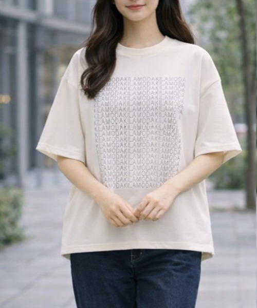 PATRIOT TAXI SELECT(パトリオットタクシーセレクト)の「【KILA MODA】きらめきロゴデザインプルオーバー(Tシャツ/カットソー・レディース・オフホワイト/グレー/ブラック・MEDIUM/LARGE/LL/3L)」の1枚目の写真