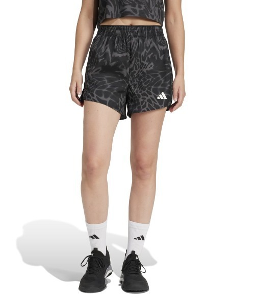 adidas(アディダス)の「アディダス adidas トレイン エッセンシャルズ 総柄プリント ワークアウトショーツ(その他パンツ・レディース・ブラック/ピンク・S/M/L/XL)」の1枚目の写真