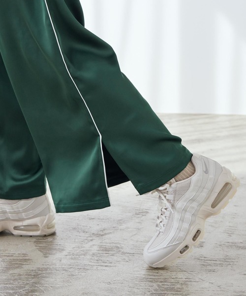 NIKE(ナイキ)の「ナイキ スポーツウェア ウィメンズ ルーズ ミッドライズ サテンパンツ / Nike Sportswear Women's Loose Mid-Rise Satin Pants IH1327-323 Fir(その他パンツ・レディース・カモフラージュ・XS/XL/M/L/S)」の8枚目の写真