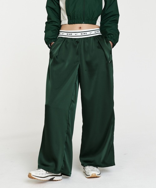 NIKE(ナイキ)の「ナイキ スポーツウェア ウィメンズ ルーズ ミッドライズ サテンパンツ / Nike Sportswear Women's Loose Mid-Rise Satin Pants IH1327-323 Fir(その他パンツ・レディース・カモフラージュ・XS/XL/M/L/S)」の9枚目の写真