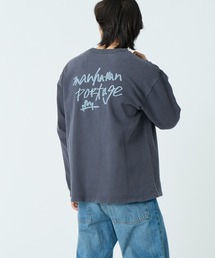 ManhattanPassage（マンハッタンパッセージ）の「[MANHATTAN PORTAGE マンハッタンポーテージ] 別注 ピグメント染め 手書き風バックロゴ刺繍ロンT（Tシャツ/カットソー）」