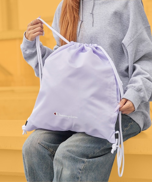 Champion(チャンピオン)の「Champion/チャンピオン LAUNDRY BAG ランドリーバッグ ナップサック サブバッグ サイドファスナー付き A4サイズ収納可能 メンズ レディース 2026年 秋 秋服 冬 冬服(バックパック/リュック・メンズ・ホワイト/ブラック/ネイビー/ライトパープル・FREE)」の1枚目の写真