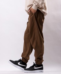 POWER TO THE PEOPLE MOVINGナイロンジョガーパンツ