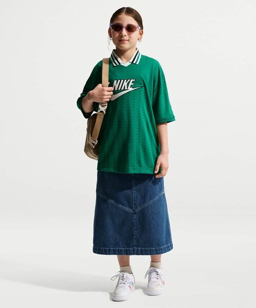 NIKE(ナイキ)の「ナイキ スポーツウェア ジュニア デニム ミディ スカート / Nike Sportswear Big Kids' Denim Midi Skirt IM8718-461 Mystic Navy(デニムスカート・キッズ・ブルー系その他・160/150/140/130)」の1枚目の写真