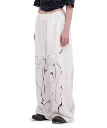 DEFGARMENTS（デフグラメンツ）の「FEATHER PAINTING PANTS [WHITE]（スウェットパンツ）」