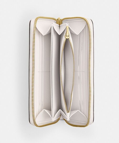 Disney(ディズニー)の「【DISNEY X COACH】エッセンシャル アコーディオン ジップ ウォレット / プルート(財布・レディース・ホワイト系その他・ONE)」の3枚目の写真