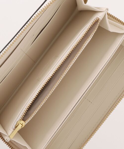 Disney(ディズニー)の「【DISNEY X COACH】エッセンシャル アコーディオン ジップ ウォレット / プルート(財布・レディース・ホワイト系その他・ONE)」の7枚目の写真