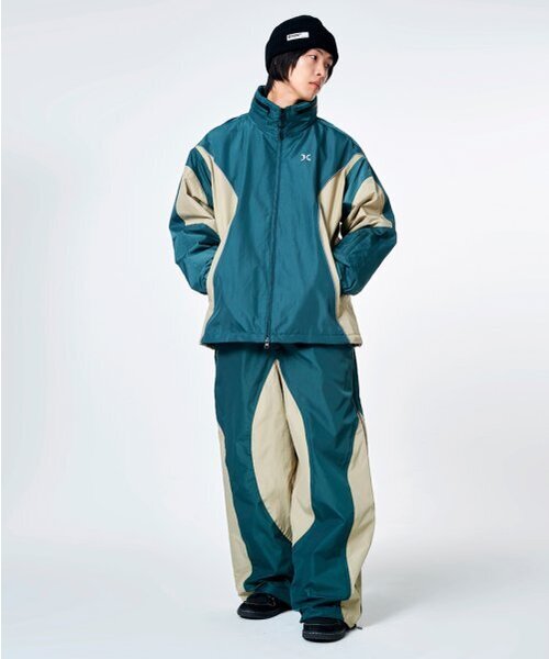 DOLL OUTERWEAR（ドラ アウターウェア）の「[DOLL x FOGUS]コラ スノーボードウェアセット（ジャケット&パンツ）ベージュグリーン 男女共用（セットアップ・レディース・その他・XX-LARGE/LARGE/MEDIUM/SMALL/X-LARGE）」の6枚目の写真