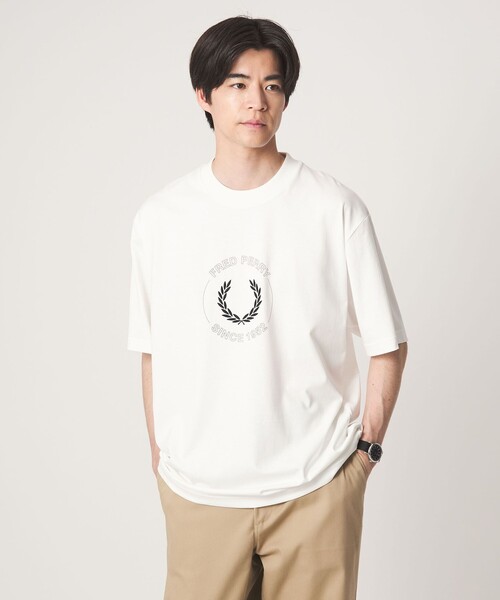 FRED PERRY(フレッドペリー)の「<FRED PERRY>サークル グラフィック ロゴ 半袖 Tシャツ(Tシャツ/カットソー・メンズ・ホワイト/ブラック・M/L)」の1枚目の写真