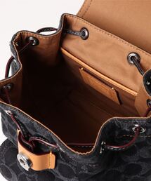 COACH（コーチ）の「リア バックパック 21・シグネチャー デニム