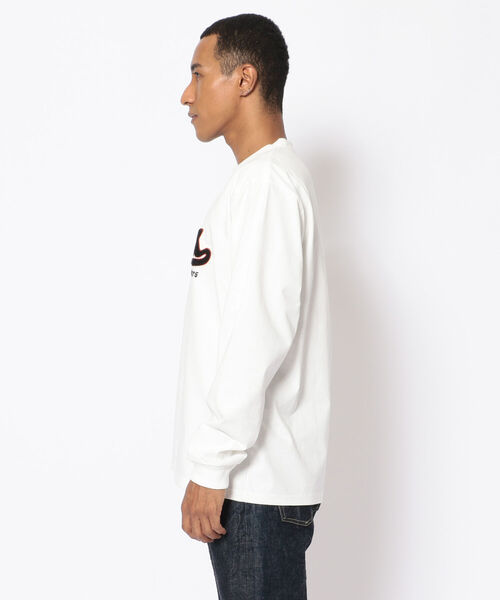 AVIREX（アヴィレックス）の「長袖 ヴァーシティ Tシャツ ロゴ&トーチ / LONG SLEEVE VARSITY T-SHIRT LOGO&TORCH / アヴィレックス / AVIREX（Tシャツ/カットソー・メンズ・ホワイト/レッド/ブラック・LARGE/MEDIUM/X-LARGE/XX-LARGE）」の4枚目の写真