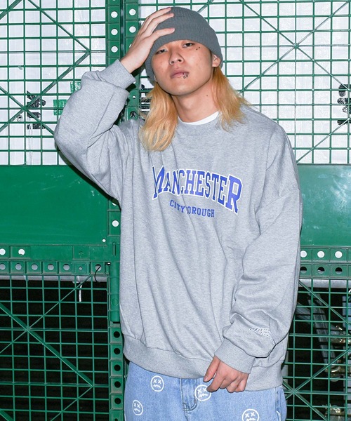 スウェット・トレーナー IONSEOUL match denim MTM KOM（ドットコム）の「『.KOM/ドットケーオーエム』MANCHESTER