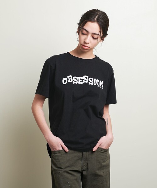 ATTISESSION(アティセッション)の「<John Holmstorm×ATTISESSION>OBSESSION Tシャツ(Tシャツ/カットソー・レディース・ブラック/ホワイト・L)」の3枚目の写真