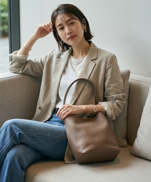 STYLE DELI(スタイルデリ)の「【DELI by】ミニマルバケットリアルレザーバッグ(レギュラー)(ショルダーバッグ・レディース・グレイッシュベージュ/ブラック/ブラウン・FREE)」の1枚目の写真