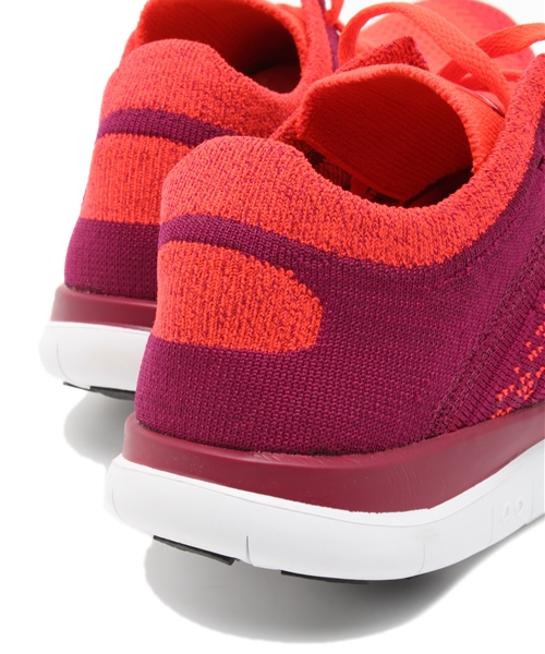 NIKE（ナイキ）の「ウィメンズ ナイキ フリー フライニット WMNS NIKE FREE 4.0 FLYKNIT 631050-616（スニーカー・レディース・レッド・24.5cm/24cm/23.5cm/23cm）」の7枚目の写真