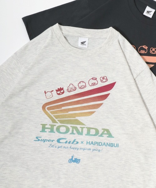 sanrio(サンリオ)の「HONDA×sanrio/ホンダ×サンリオ 『はぴだんぶい』『スーパーカブ』コラボプリント半袖Tシャツ レディース メンズ(Tシャツ/カットソー・レディース・ブルーグリーン/オートミール/スミクロ/ネイビー・M/L/LL)」の3枚目の写真