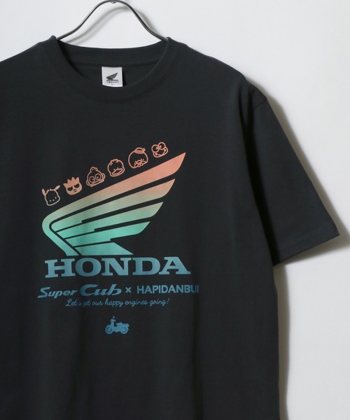 sanrio(サンリオ)の「HONDA×sanrio/ホンダ×サンリオ 『はぴだんぶい』『スーパーカブ』コラボプリント半袖Tシャツ レディース メンズ(Tシャツ/カットソー・レディース・ブルーグリーン/オートミール/スミクロ/ネイビー・M/L/LL)」の19枚目の写真