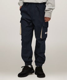 TOMMY HILFIGER | 【日本限定】 Urban Explorer ミックスファブリックユーティリティカーゴパンツ(カーゴパンツ)